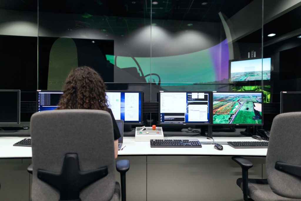female engineer controlling flight simulator